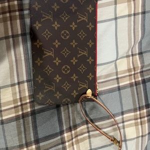Authentic Louis Vuitton Neverfull pouch new with tag